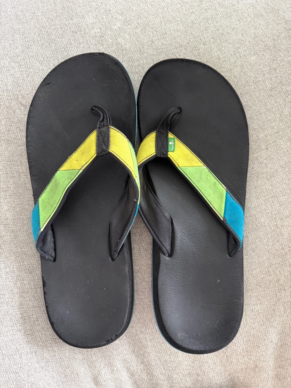 Sanuk Flip Flops with Yellow, Green, and Blue Straps